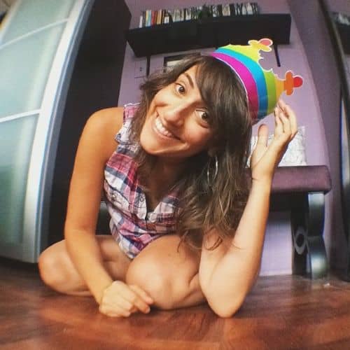 Arielle Scarcella | Wearing rainbow crown | Lesbian Influencers on Afluencer