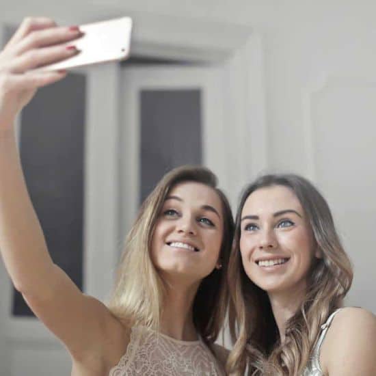 Women taking selfie together