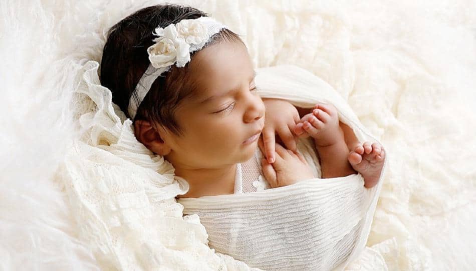 BellyBabyWear | Baby wrapped in white frills | Brands looking for influencers
