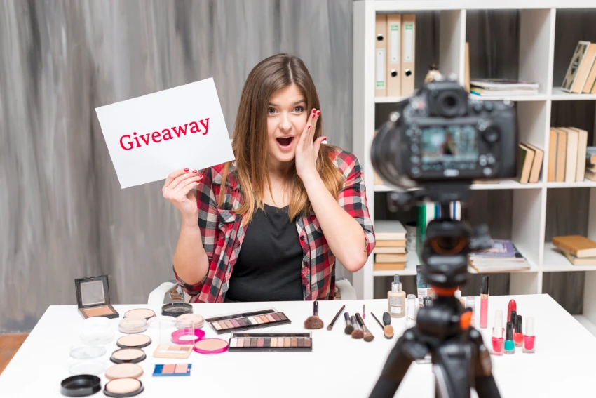 Makeup influencer announcing a giveaway during her live Facebook stream
