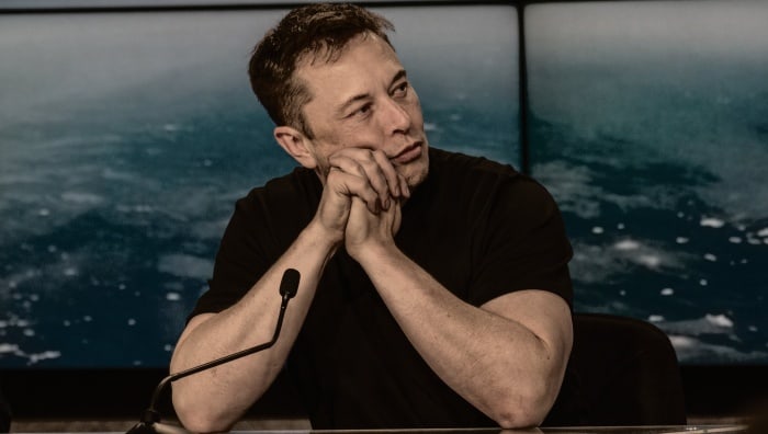Elon Musk | Gazes into space during a press conference
