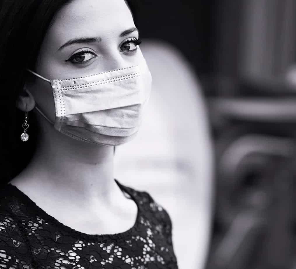 Influencer wearing mask to protect against coronavirus