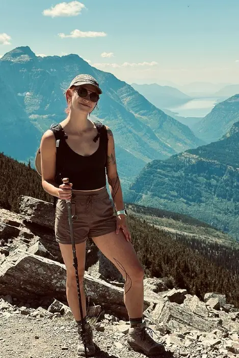 Robyn Bedford holding hiking pole in the mountains