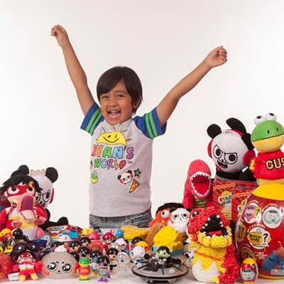 Famous Influencer under 10 surrounded by toys