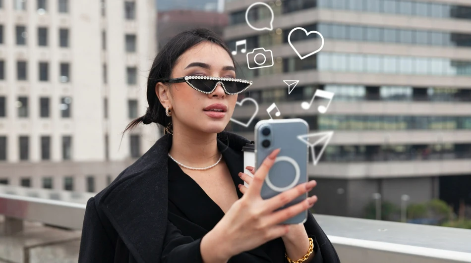 Trendy woman engaging on social media dressed in black